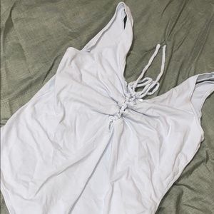 Light blue tie in front body suit